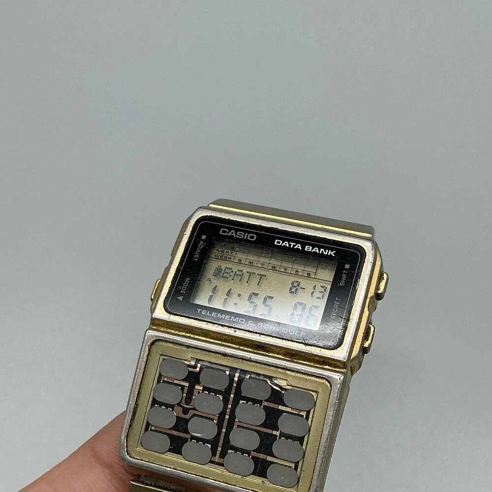 Vintage Casio DBC-610 Data Bank Mens Watch 32mm Gold Calculator Quartz Alarm